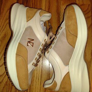 New in box tan, cream and gold NZ sneakers with extra inserts, size 7.
